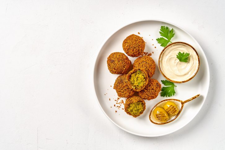 Chickpeas,Falafel,With,Tahini,Sauce.,Top,View,,Copy,Space